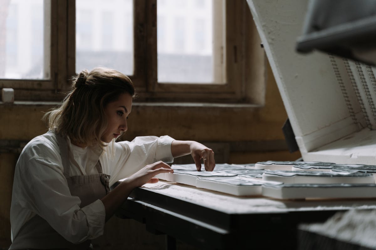 Sage Chen, founder of Vancouver XOXO, working in her East Vancouver studio