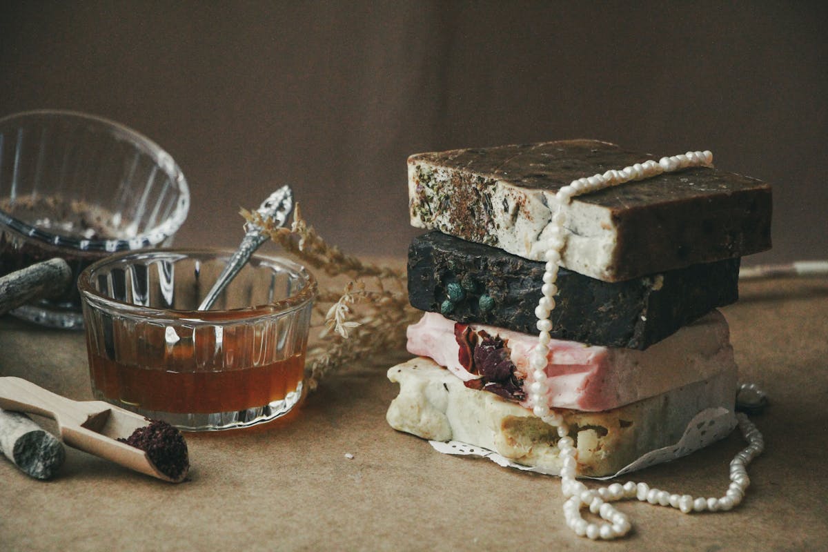 Rain forest cold-process soap bar stacked on craft paper